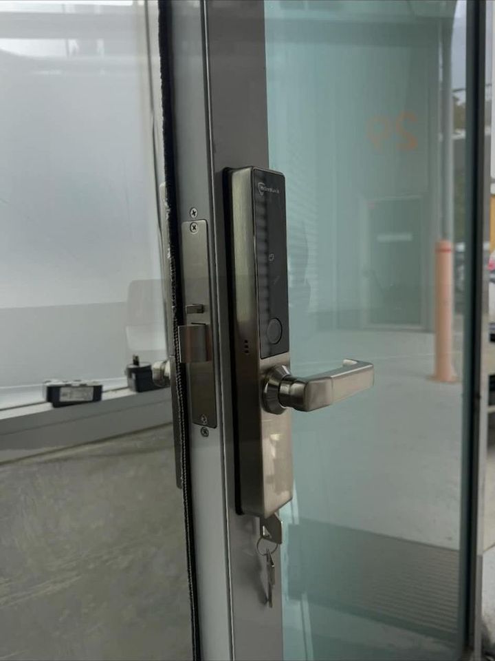 Keypad lock on a glass shopfront